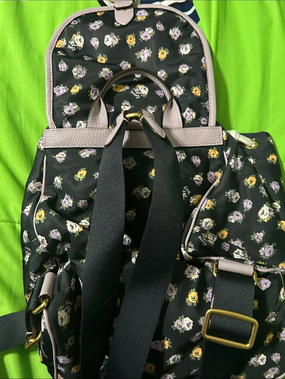 Coach Black Floral Backpack with Lavender Trim and Gold Hardware
